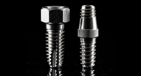CNC machined parts for surgical stainless steel implants (e.g., bone screws) and medical-grade titanium implants (e.g., dental posts)